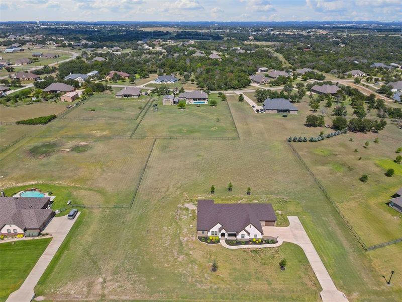 Aerial view of property and surrounding area featuring rural landscape Aerial view of property and surrounding area featuring rural landscape