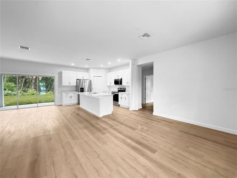 Open Floor Plan with Luxury Vinyl Plank Flooring