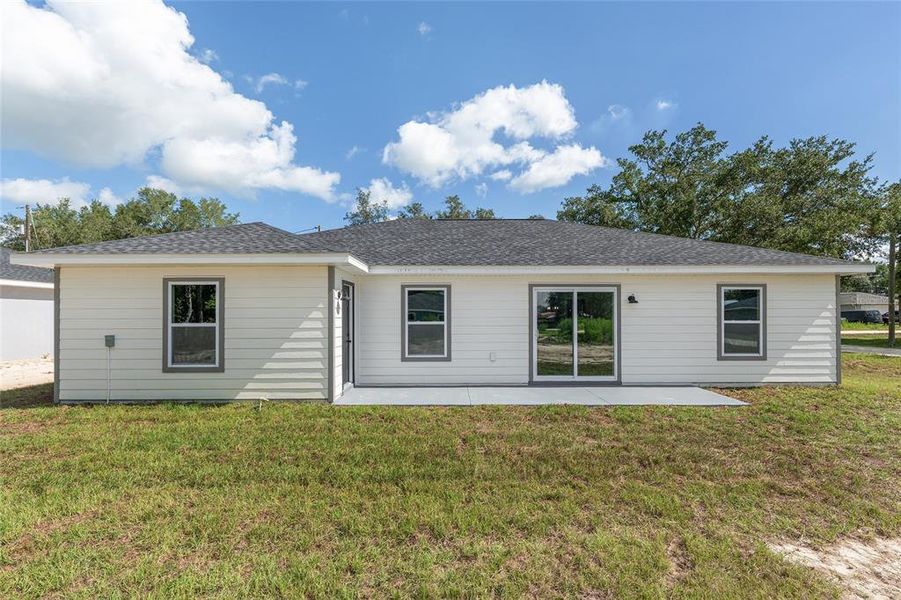 Front exterior of a new home in , Dunnellon, FL, highlighting curb appeal (Image 27).