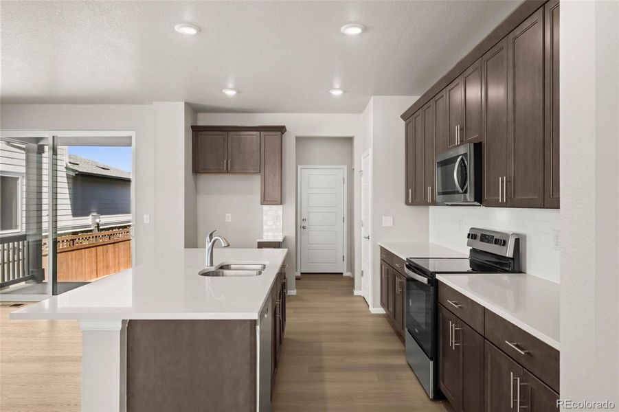 Furnished interior view inside a new home in Painted Prairie, Aurora (Image 7).