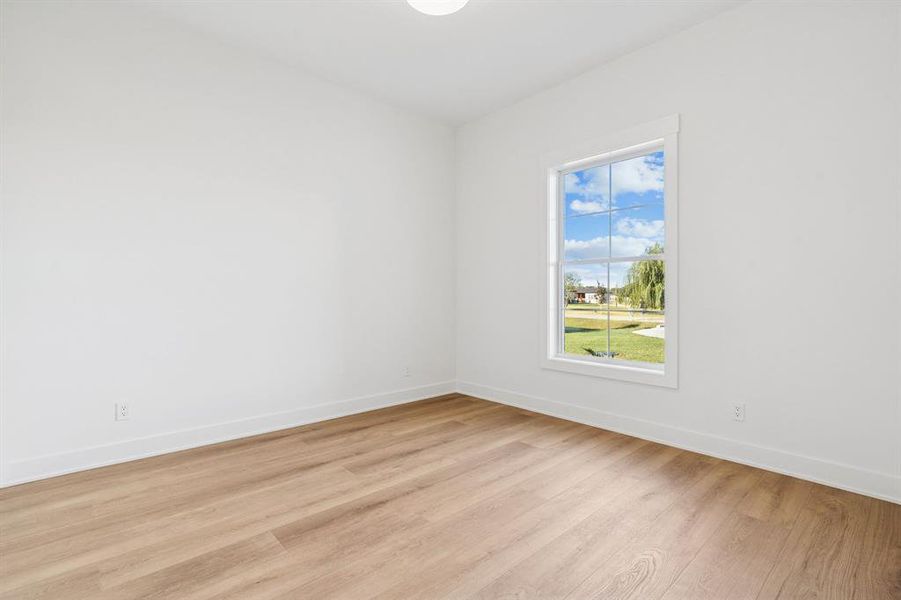 Secondary bedroom number one at the front of the home.