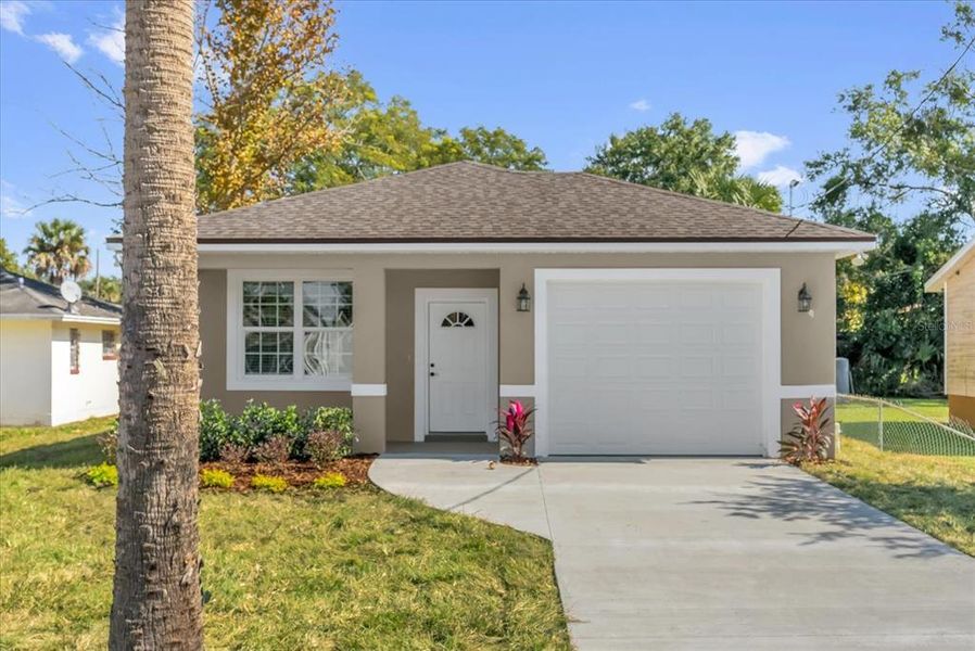 Front exterior of a new home in , Sanford, FL, highlighting curb appeal (Image 1). Front exterior of a new home in , Sanford, FL, highlighting curb appeal (Image 1).