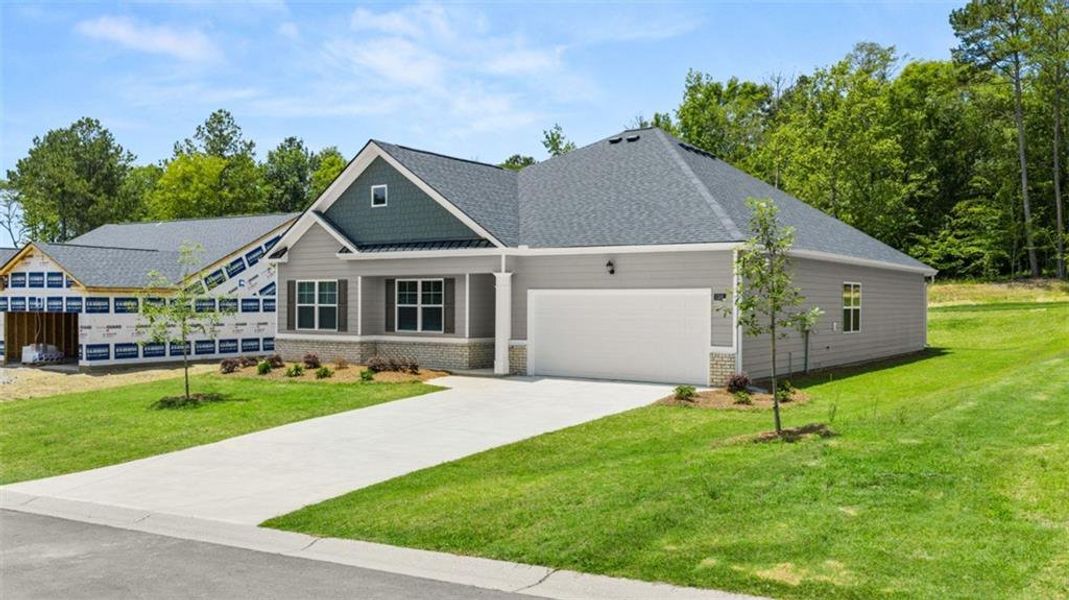 Front exterior of a new home in Kingston Ranch at Lake Oconee, Buckhead, GA, highlighting curb appeal (Image 21). Front exterior of a new home in Kingston Ranch at Lake Oconee, Buckhead, GA, highlighting curb appeal (Image 21).