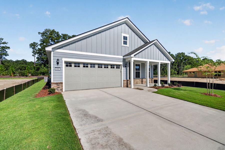 Front exterior of a new home in Del Webb Charleston at Nexton, Summerville, SC, highlighting curb appeal (Image 20).