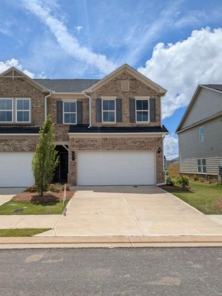 Front exterior of a new home in Alcovy Meadows, Dacula, GA, highlighting curb appeal (Image 1). Front exterior of a new home in Alcovy Meadows, Dacula, GA, highlighting curb appeal (Image 1).