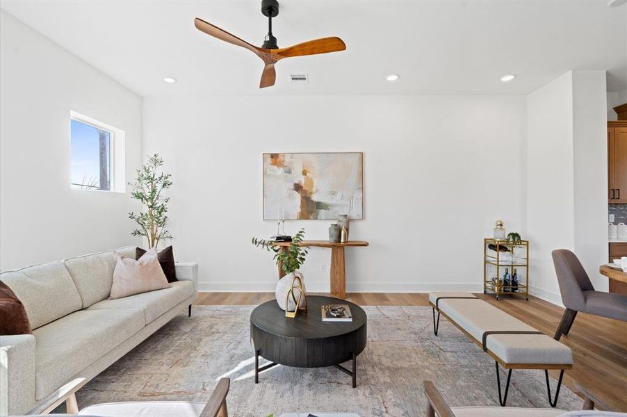 Living area off of the kitchen gets tons of natural light.