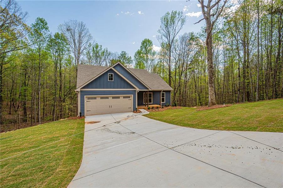 Front exterior of a new home in , Murrayville, GA, highlighting curb appeal (Image 25).