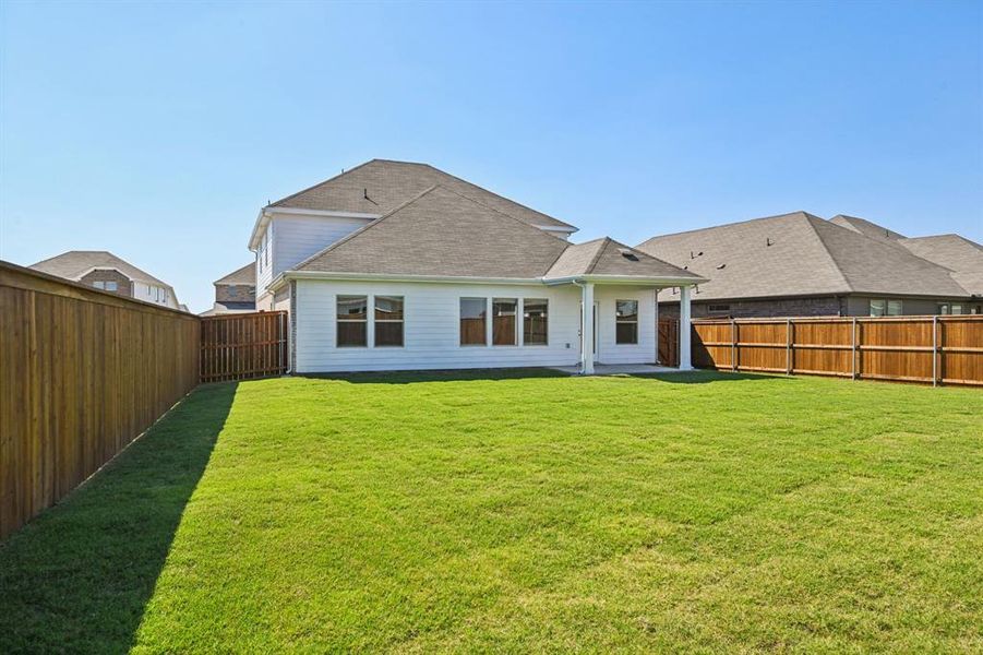 Exterior details and patio area of a home in Lakehaven - Signature Series, Farmersville (Image 2). Exterior details and patio area of a home in Lakehaven - Signature Series, Farmersville (Image 2).