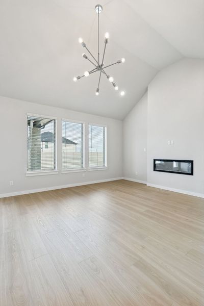 Living Room in the Stanley II home plan by Trophy Signature Homes – REPRESENTATIVE PHOTO