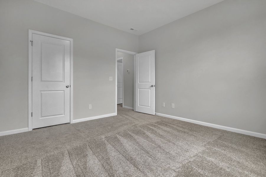 Spacious, unfurnished interior of a new home in Grand Park, Leland (Image 28). Spacious, unfurnished interior of a new home in Grand Park, Leland (Image 28).