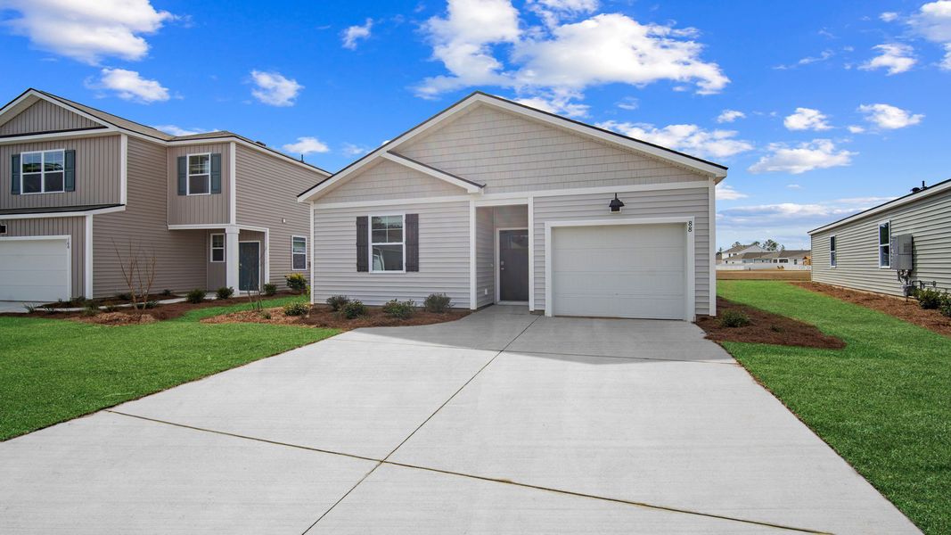 Front exterior of a new home in Rice Hope, Port Wentworth, GA, highlighting curb appeal (Image 2).