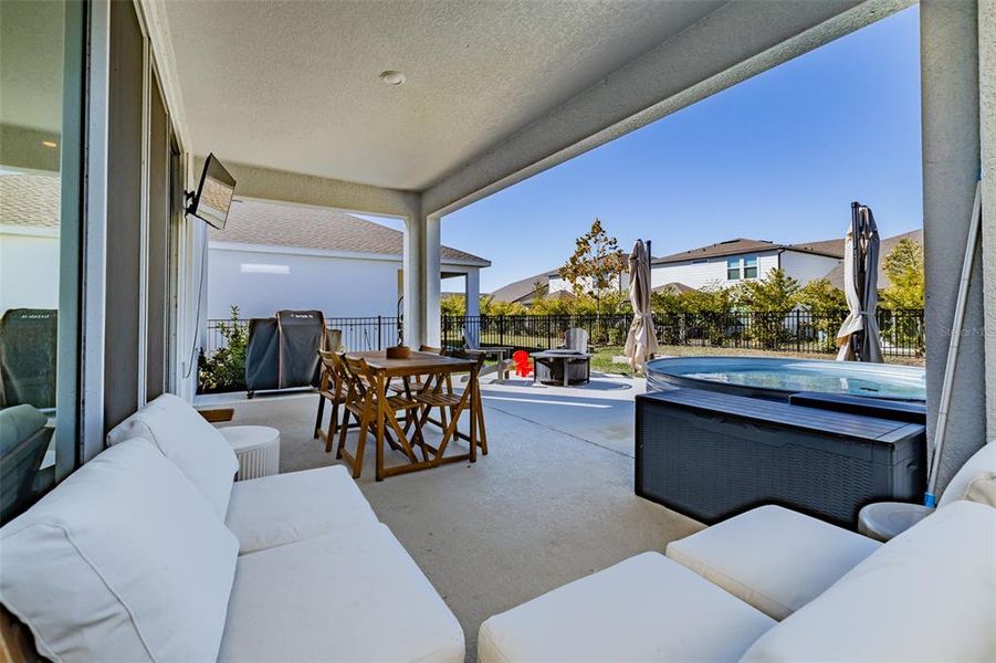 Exterior details and patio area of a home in Waterset Garden Series, Apollo Beach (Image 26).