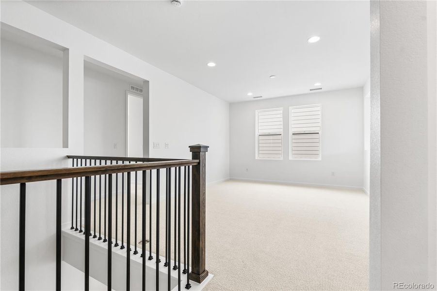 Spacious, unfurnished interior of a new home in Stargaze at Solstice, Littleton (Image 36).