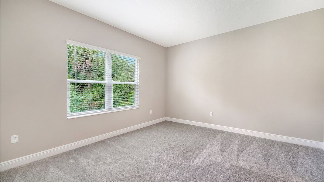 Spacious, unfurnished interior of a new home in Wildleaf Real Estate and Homes for Sale in Parrish, FL - Neal Communities, Parrish (Image 15).