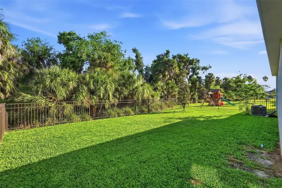 Exterior details and patio area of a home in , Parrish (Image 22).