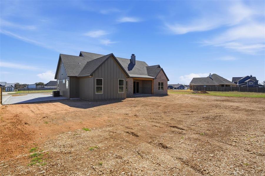 Exterior details and patio area of a home in , West (Image 25).