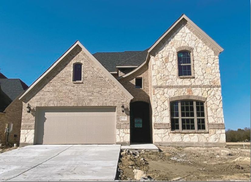 Beautiful stone & brick elevation on quiet corner, cul-de-sac lot.