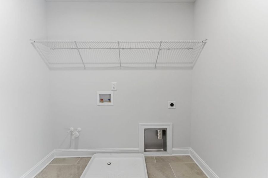 Representative unfurnished interior of a home built from the Fairfield Lux by Keystone Homes NC in Weybridge, Burlington (Image 111).