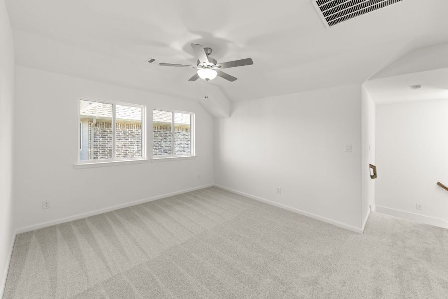 Spacious, unfurnished interior of a new home in The Reserve at Spiritas Ranch, Little Elm (Image 22).