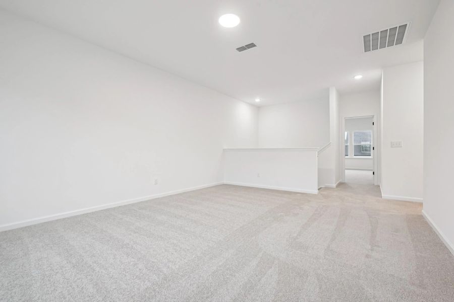 Loft featuring the AW Collection® Foundry - Open, elevated space for modern living.