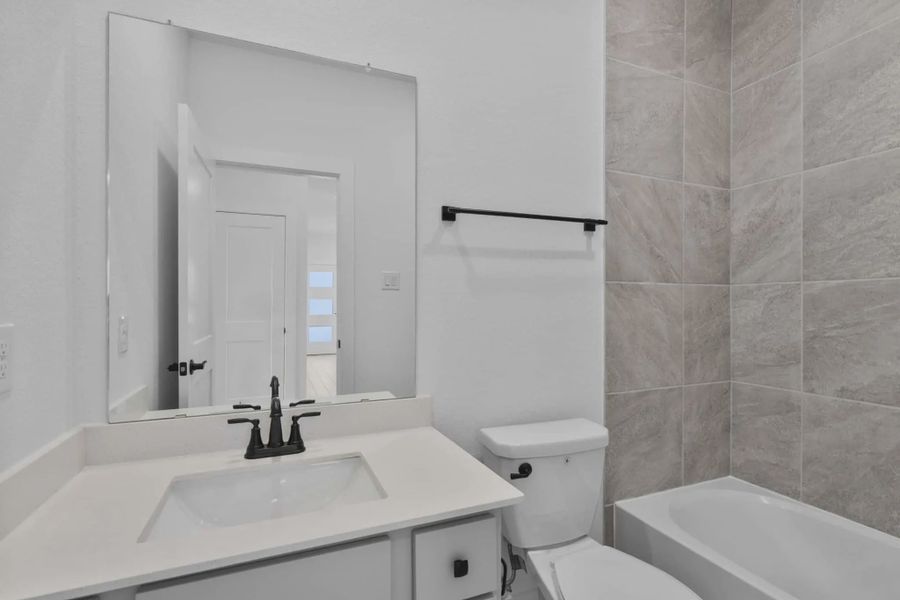 Furnished interior view inside a new home in Elyson Courtyard Collection, Katy (Image 7).