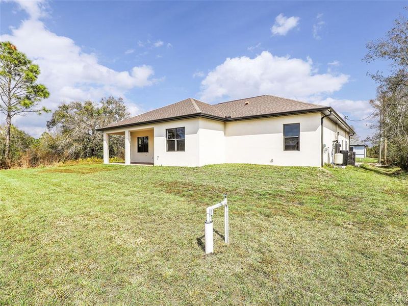 Exterior details and patio area of a home in , Port Charlotte (Image 28).
