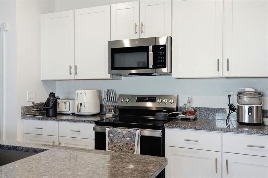 Furnished interior view inside a new home in The Isle of Avalon, Spring Hill (Image 7).