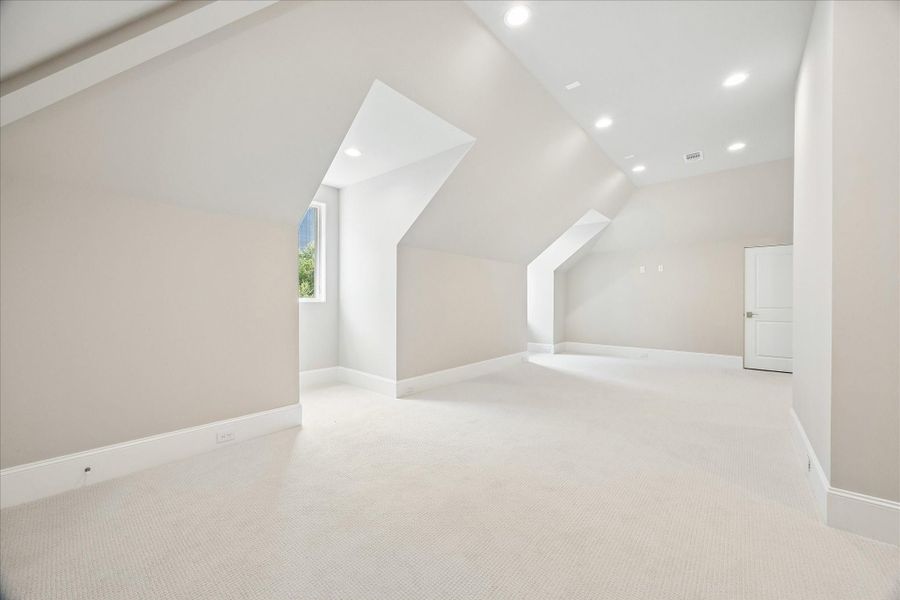 The third floor is a great space for a gameroom, lounge, office, exercise space or more!