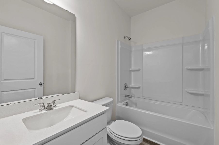 Representative furnished interior of a home built from the Falcon by Starlight Homes in Williams Landing, Waller (Image 13).