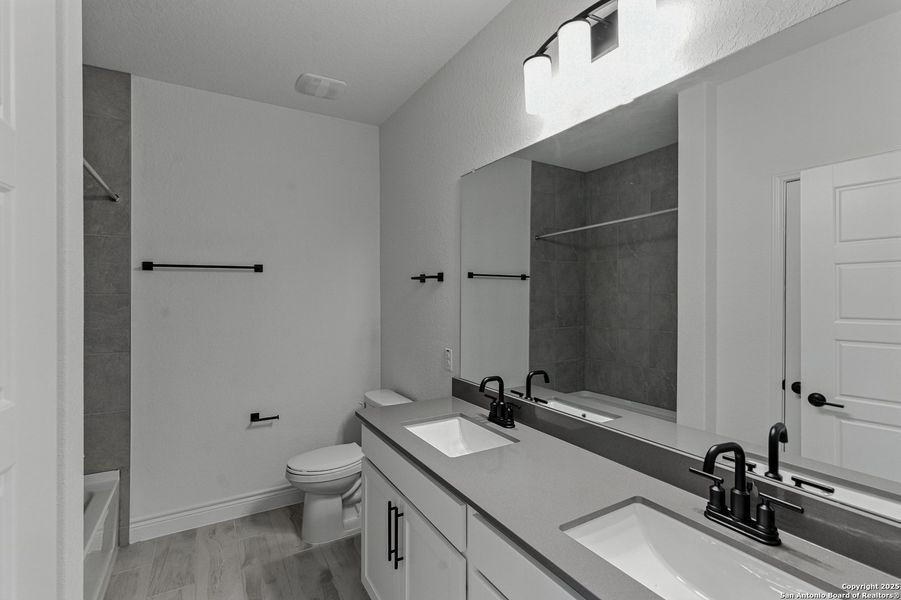 Furnished interior view inside a new home in Davis Ranch, San Antonio (Image 9). Furnished interior view inside a new home in Davis Ranch, San Antonio (Image 9).