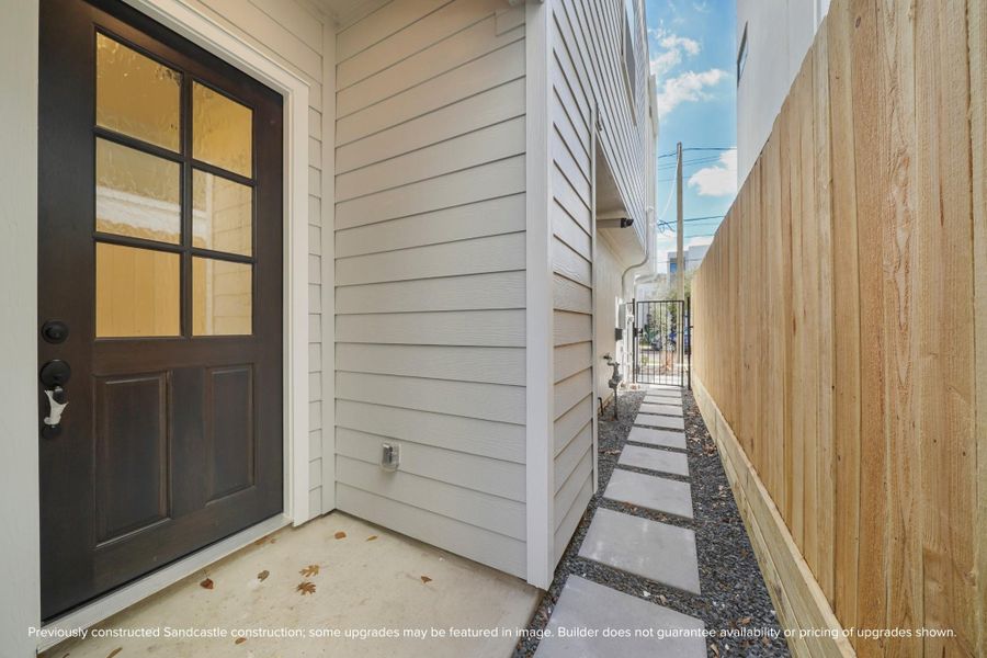Enjoy the peace of mind with a gated entry and private walkway leading to the front door of your new home. Enjoy the peace of mind with a gated entry and private walkway leading to the front door of your new home.