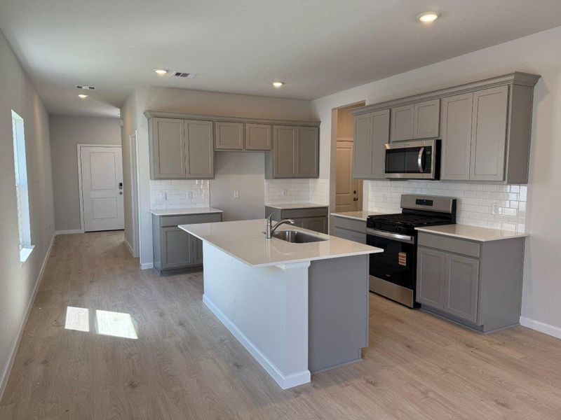 Furnished interior view inside a new home in Midtown Reserve, College Station (Image 4). Furnished interior view inside a new home in Midtown Reserve, College Station (Image 4).