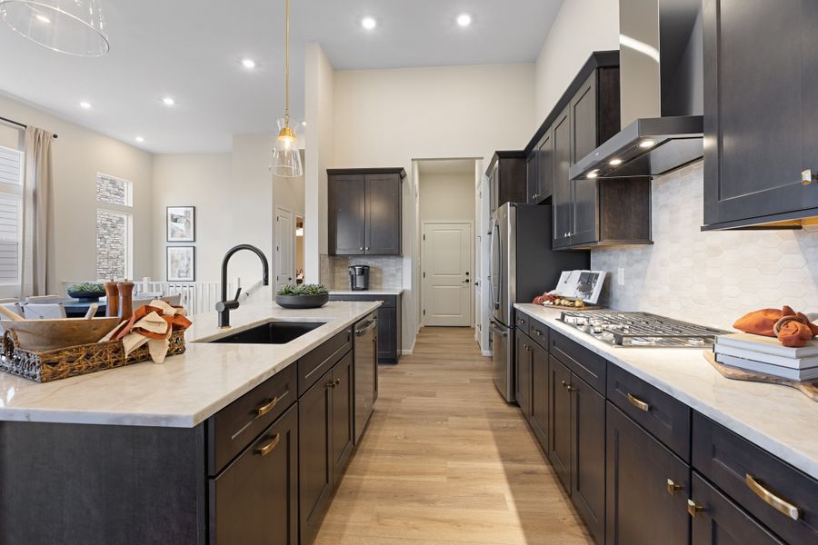 Representative furnished interior of a home built from the 5002 by Risewell Homes in The Estates Collection at Murphy Creek, Aurora (Image 10).