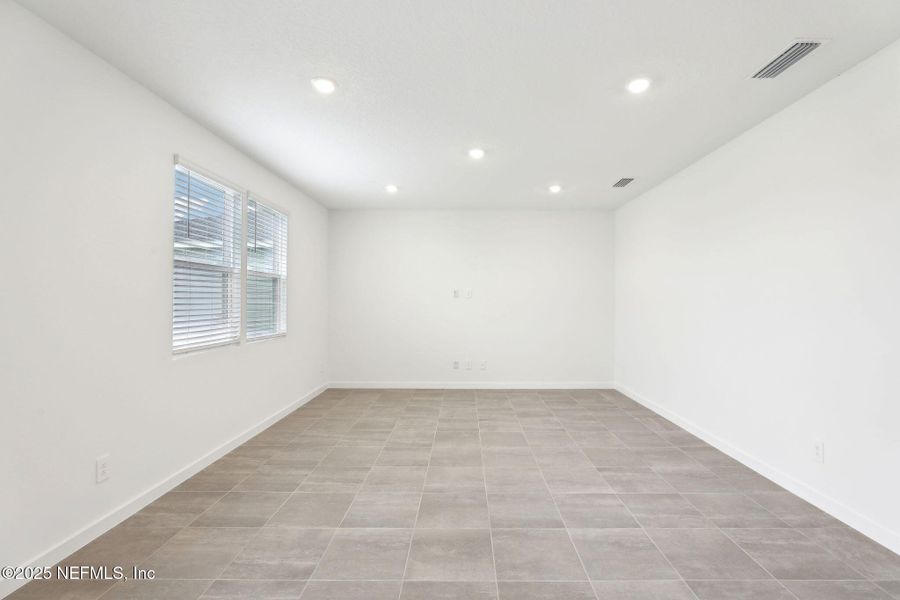 Spacious, unfurnished interior of a new home in Lakes at Bella Lago - Signature Series, Green Cove Springs (Image 13). Spacious, unfurnished interior of a new home in Lakes at Bella Lago - Signature Series, Green Cove Springs (Image 13).