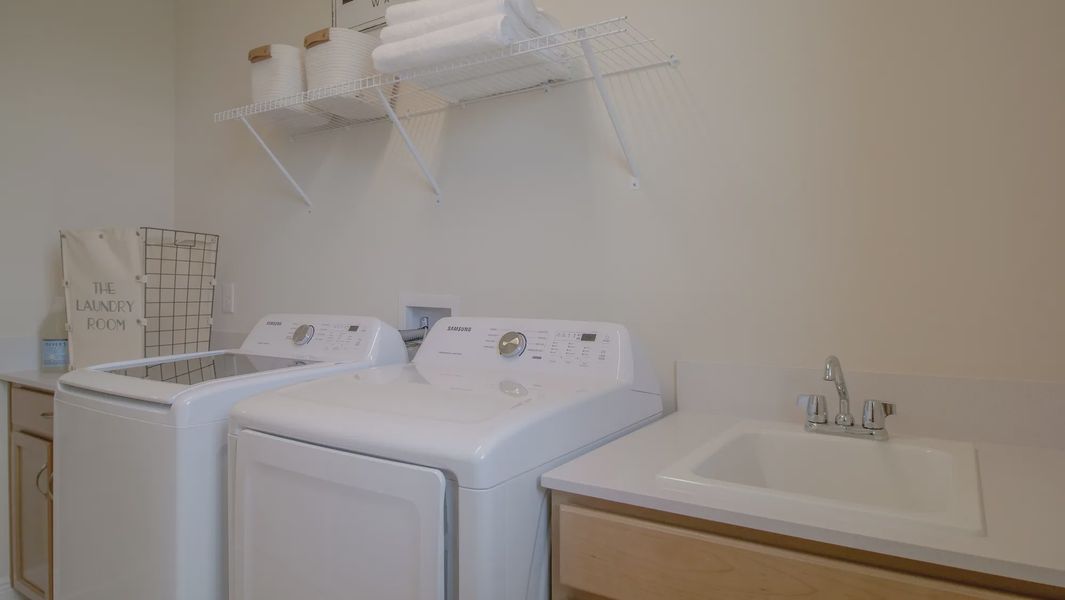 Representative furnished interior of a home built from the Woodmere II by Jones Homes USA in Reserve at Twin Lakes, St. Cloud (Image 6). Representative furnished interior of a home built from the Woodmere II by Jones Homes USA in Reserve at Twin Lakes, St. Cloud (Image 6).