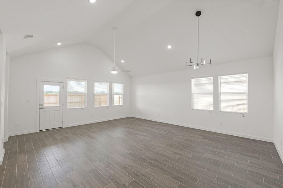 Open great room and dining area (*Photo not of actual home and used for illustration purposes only.)