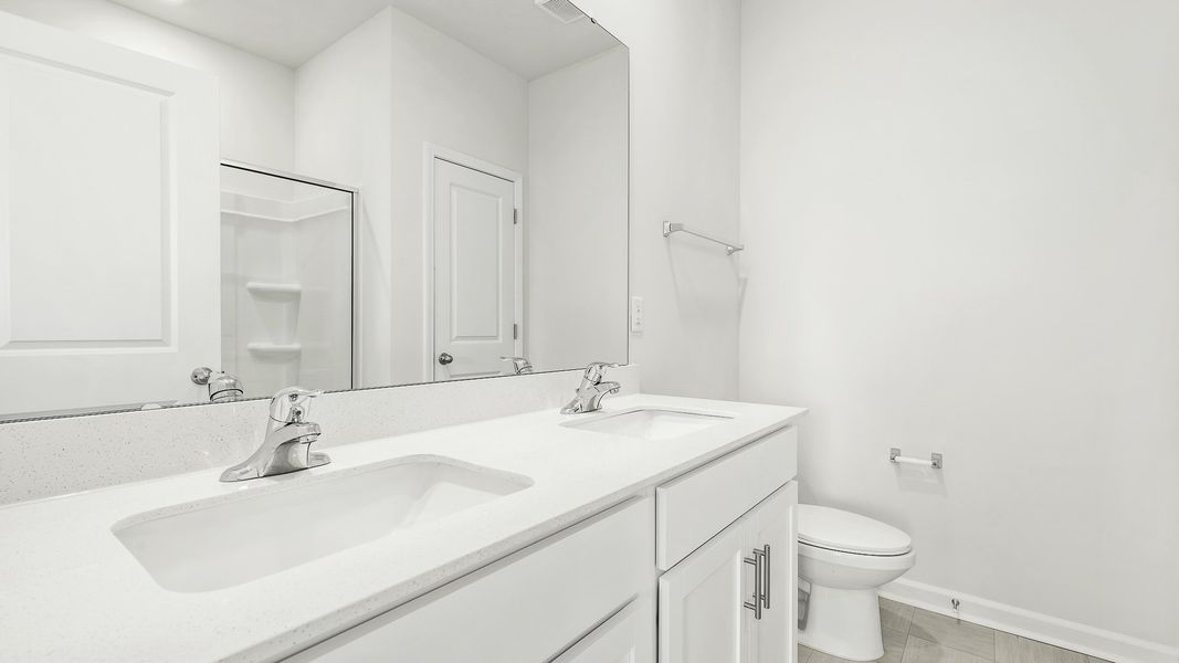 Representative furnished interior of a home built from the WINSTON by D.R. Horton in The Preserve at Kinsley, Jamestown (Image 5).
