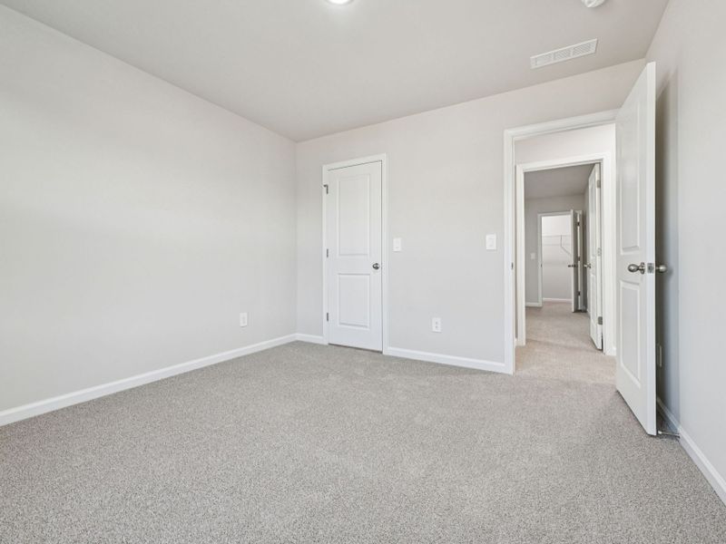Spacious, unfurnished interior of a new home in Oak Manor - Signature Series, Garner (Image 18). Spacious, unfurnished interior of a new home in Oak Manor - Signature Series, Garner (Image 18).