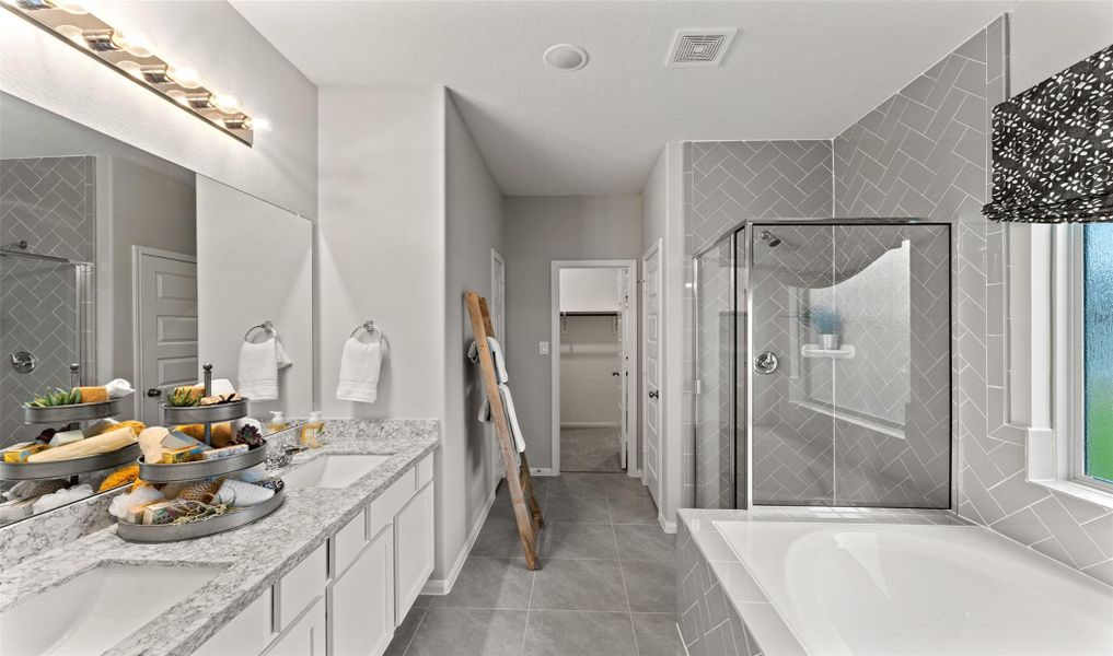 Relaxing owner's bath (*Photo not of actual home and used for illustration purposes only.)