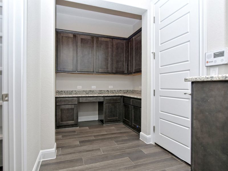 Representative furnished interior of a home built from the San Simeon II by Giddens Homes in Clearwater Ranch, Liberty Hill (Image 10).