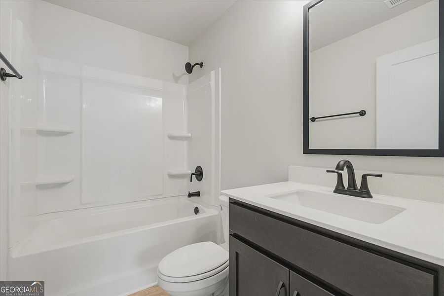 Furnished interior view inside a new home in Canterbury Villas, Carrollton (Image 19).
