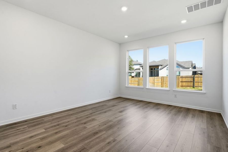Spacious, unfurnished interior of a new home in Parkside on the River, Georgetown (Image 15).