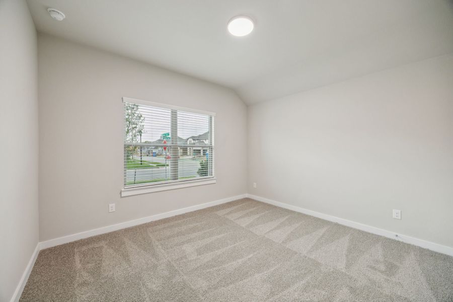 Bedroom in the Oscar home plan by Trophy Signature Homes – REPRESENTATIVE PHOTO Bedroom in the Oscar home plan by Trophy Signature Homes – REPRESENTATIVE PHOTO