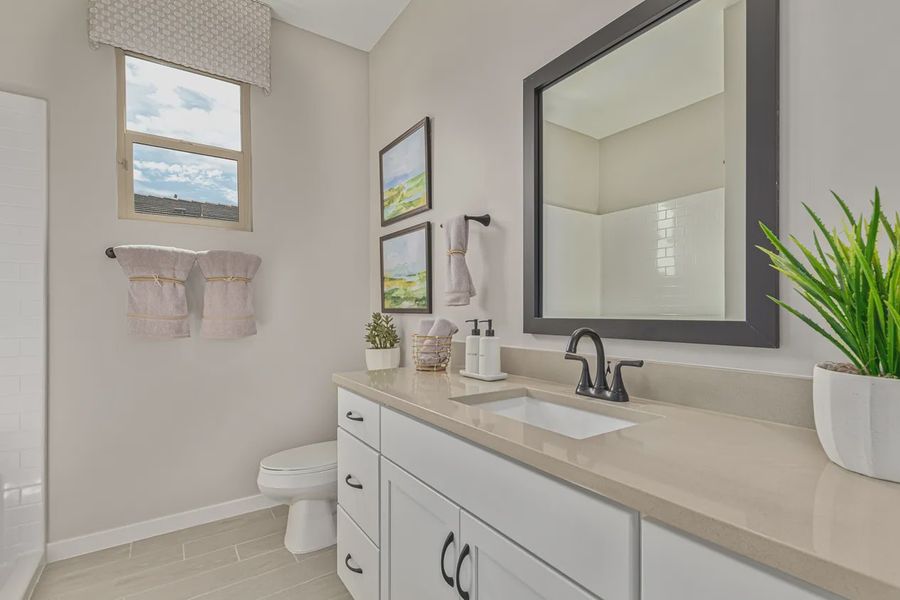 Representative furnished interior of a home built from the 1901 by Elliott Homes in Camilo at Santana, Yuma (Image 24).
