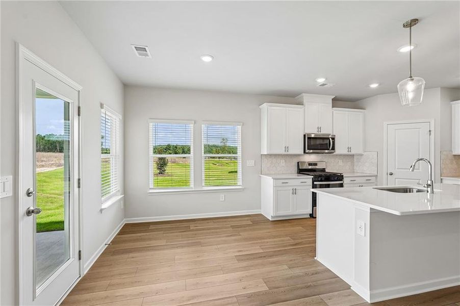Furnished interior view inside a new home in Northwoods at Mirror Lake, Villa Rica (Image 16).