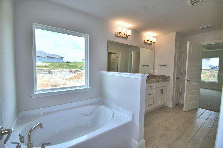 Furnished interior view inside a new home in Cadence Crossing, Auburndale (Image 13). Furnished interior view inside a new home in Cadence Crossing, Auburndale (Image 13).