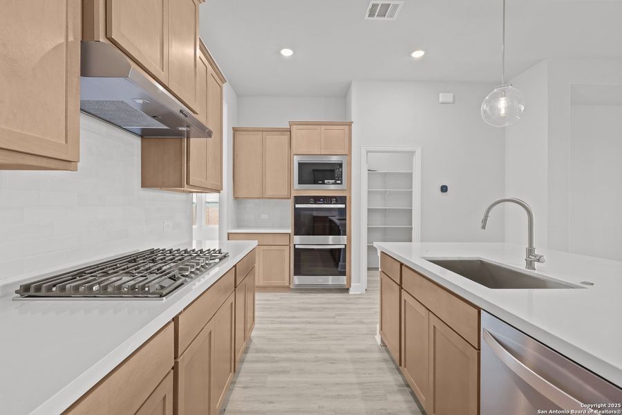 Furnished interior view inside a new home in Homestead, Schertz (Image 13).