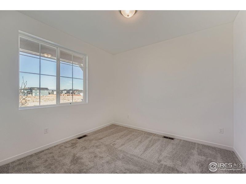 Spacious, unfurnished interior of a new home in Farmstead, Berthoud (Image 22).