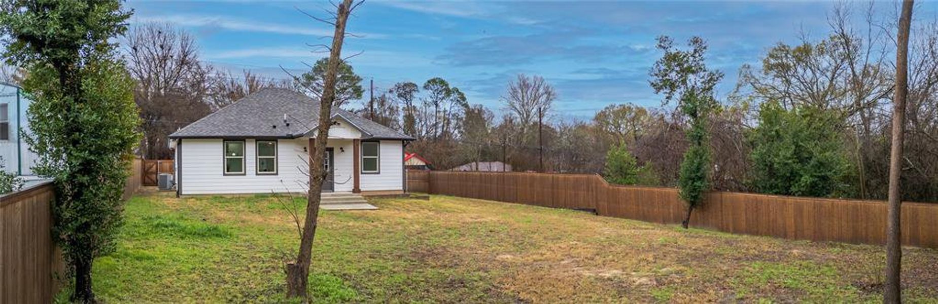 View of yard with central AC unit