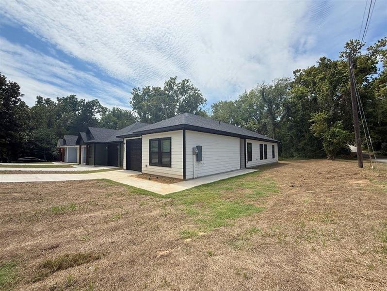Front exterior of a new home in , Denison, TX, highlighting curb appeal (Image 15). Front exterior of a new home in , Denison, TX, highlighting curb appeal (Image 15).